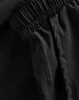 Fabric and seam detail of Cuera Women's Active Globe Shorts in Black