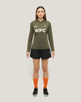 Woman wearing Cuera Women's Active Globe Shorts in Black with matching top, front studio view