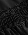 Elastic waistband detail of Cuera Women's Active Globe Shorts in Black